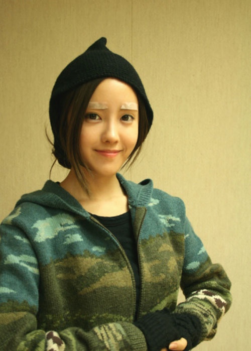 Whose Hands Are Those around Hyomin’s Breasts?