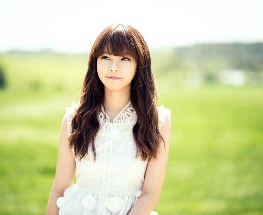Juniel Strums the Guitar Dressed As a Kitty