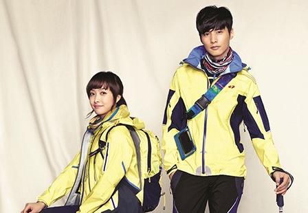 Won Bin poses with f(x)’s Victoria for Outdoor Gear Brand