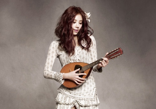 Son Dambi Exudes Femme Fatale Charms For “Marie Claire”