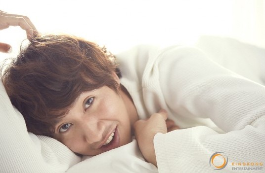 Lee Kwang Soo Becomes a Warm Spring Man for a Bedside Pictorial