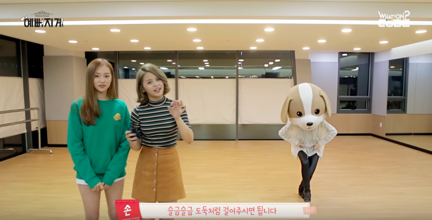 Watch: CLC Plays With Puppy Costume in Practice Video for “High Heels”