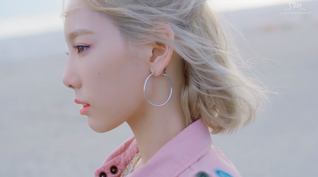 Watch: Taeyeon Soaks Up The Sun In Solo Comeback “Why” MV