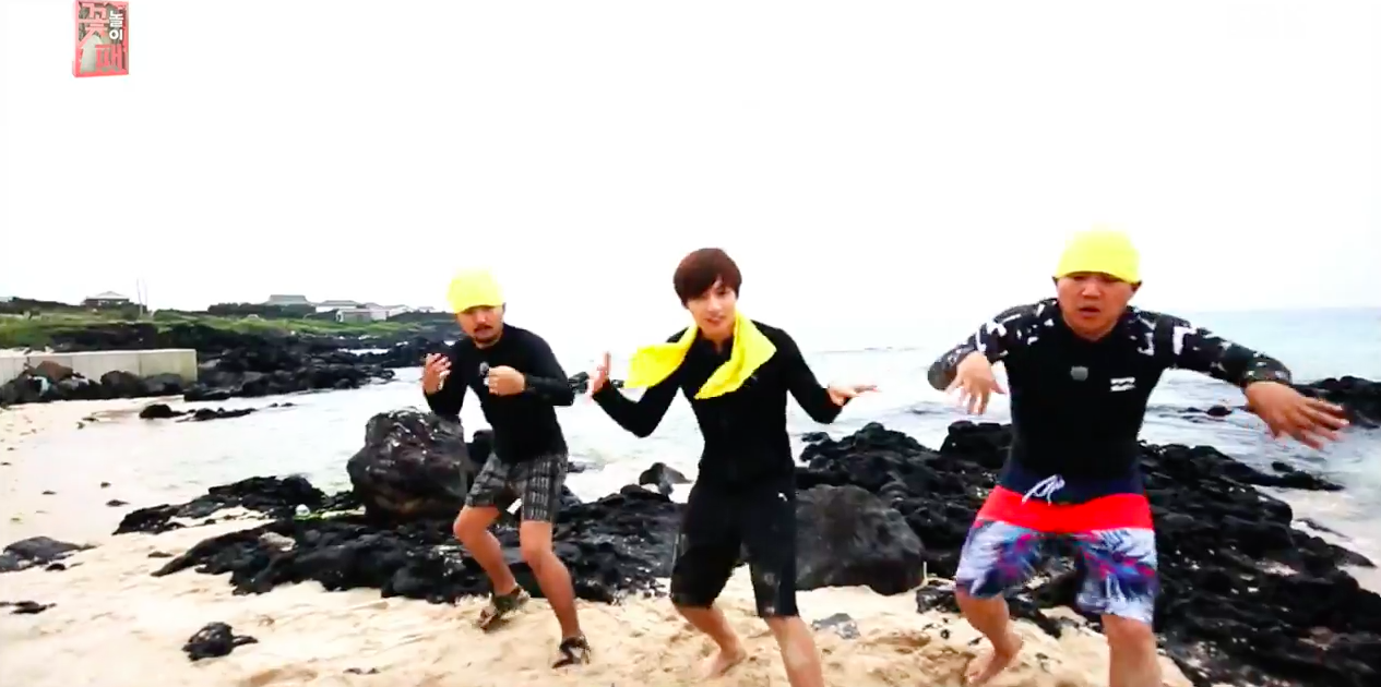 Watch: BTS’s Jungkook Films A Funny Beach Version Of “Fire” MV With Jo Se Ho And Yoo Byung Jae