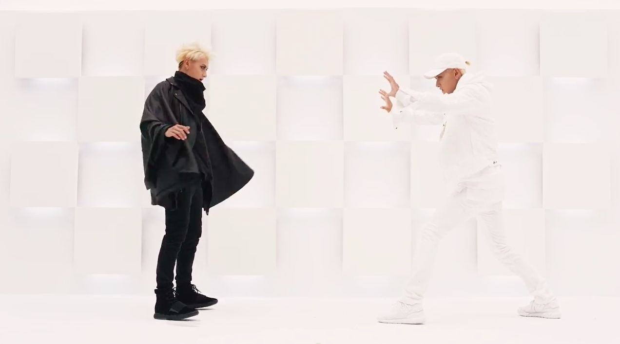 Watch: Tao's Two Sides Face Off In “Black White (AB)” MV