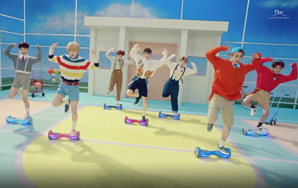 NCT Dream Shows Off Impressive Hoverboarding Skills In 'Chewing Gum' Performance Video