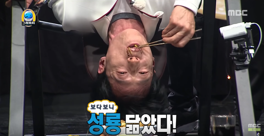 Watch: 'Infinite Challenge' Members Try Eating Upside Down In Anti-Gravity Training