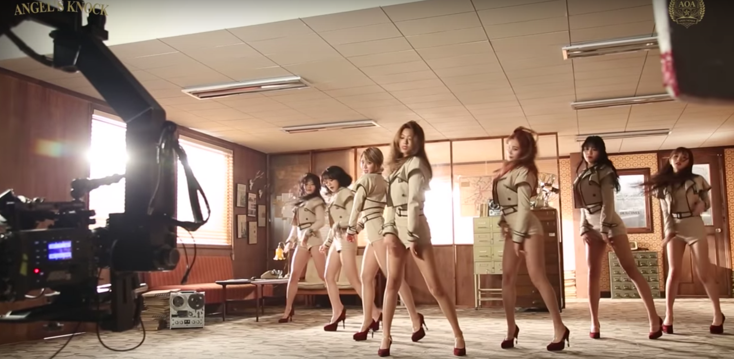 Watch: AOA Has A Fun Time Trying Out Magic Tricks And Detective Skills In MV Making Film