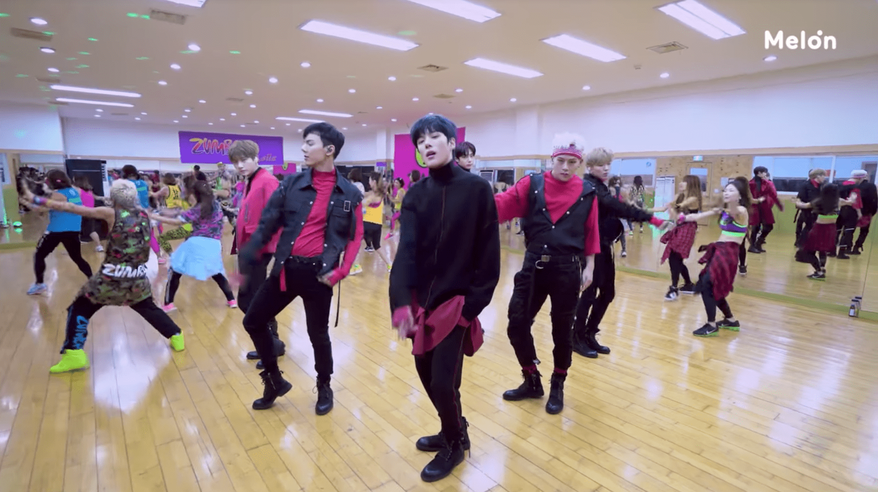 Watch: MONSTA X Is Forced To Perform 'Dramarama' With No Music In Middle Of Jam-Packed Zumba Class