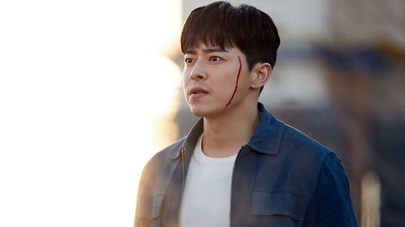 Jo Jung Suk Narrowly Escapes Danger With A Few Scratches In New Stills For 'Two Cops'