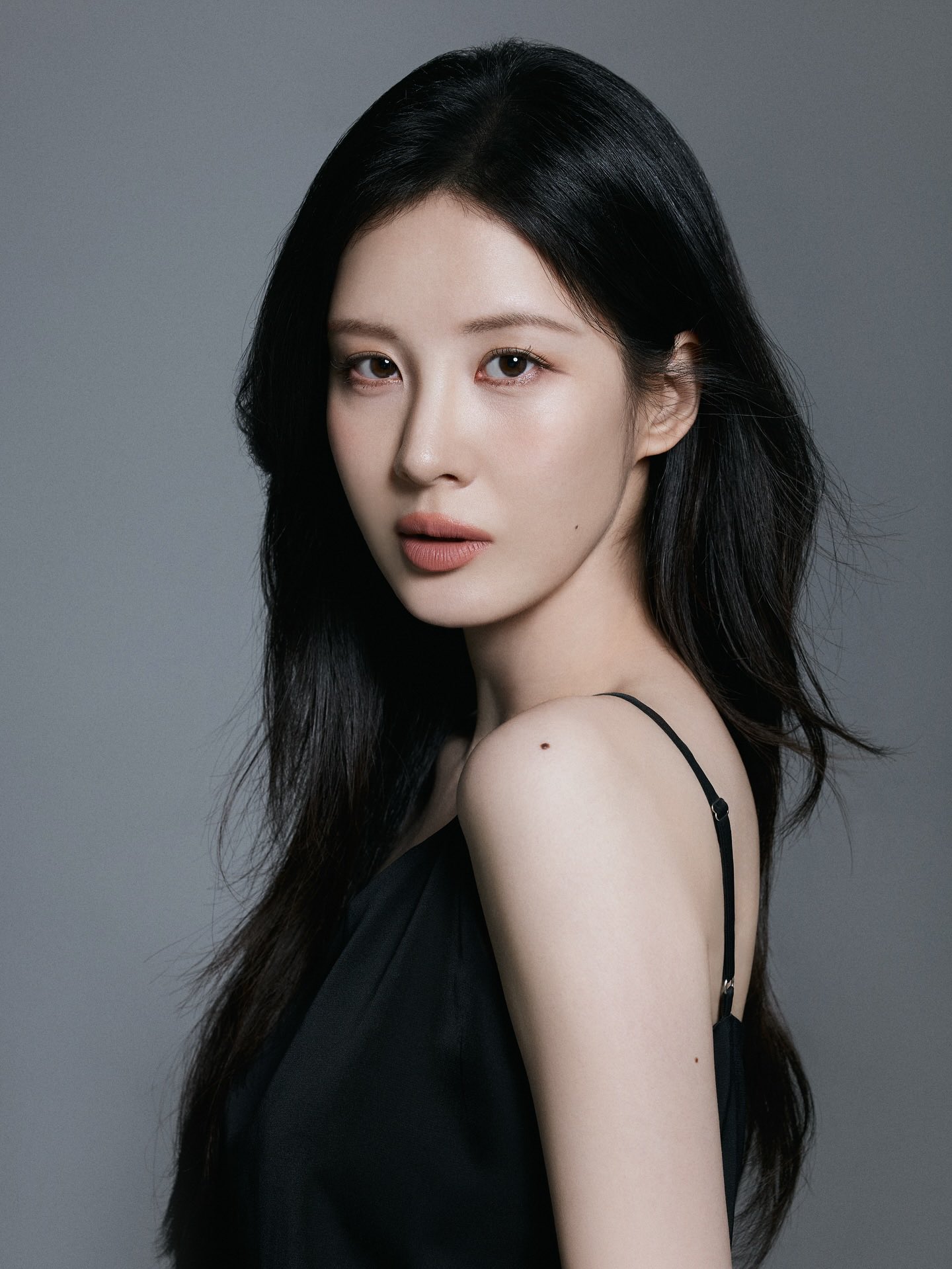 Seohyun in a black outfit, giving off a chic and confident vibe.