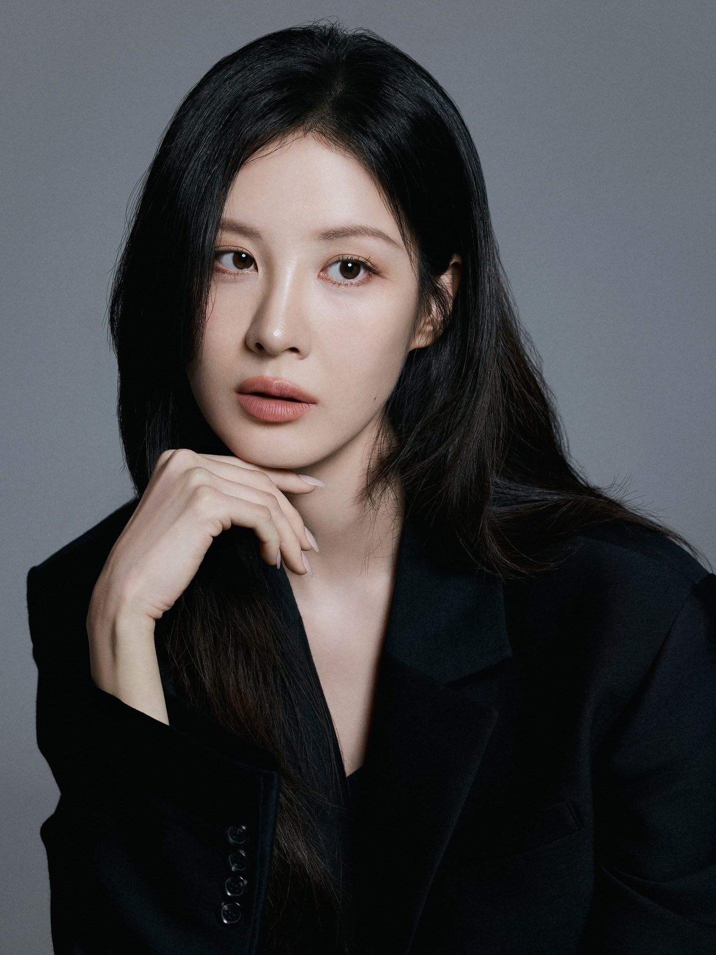 Seohyun in a black outfit, showcasing a sophisticated and confident aura.