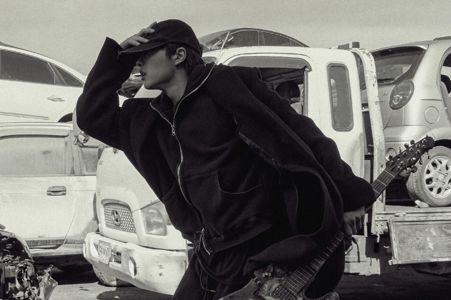 WOODZ Desperately Flees With A Cursed Guitar In New Poster For Mystery Short Film “Slide Strum Mute”