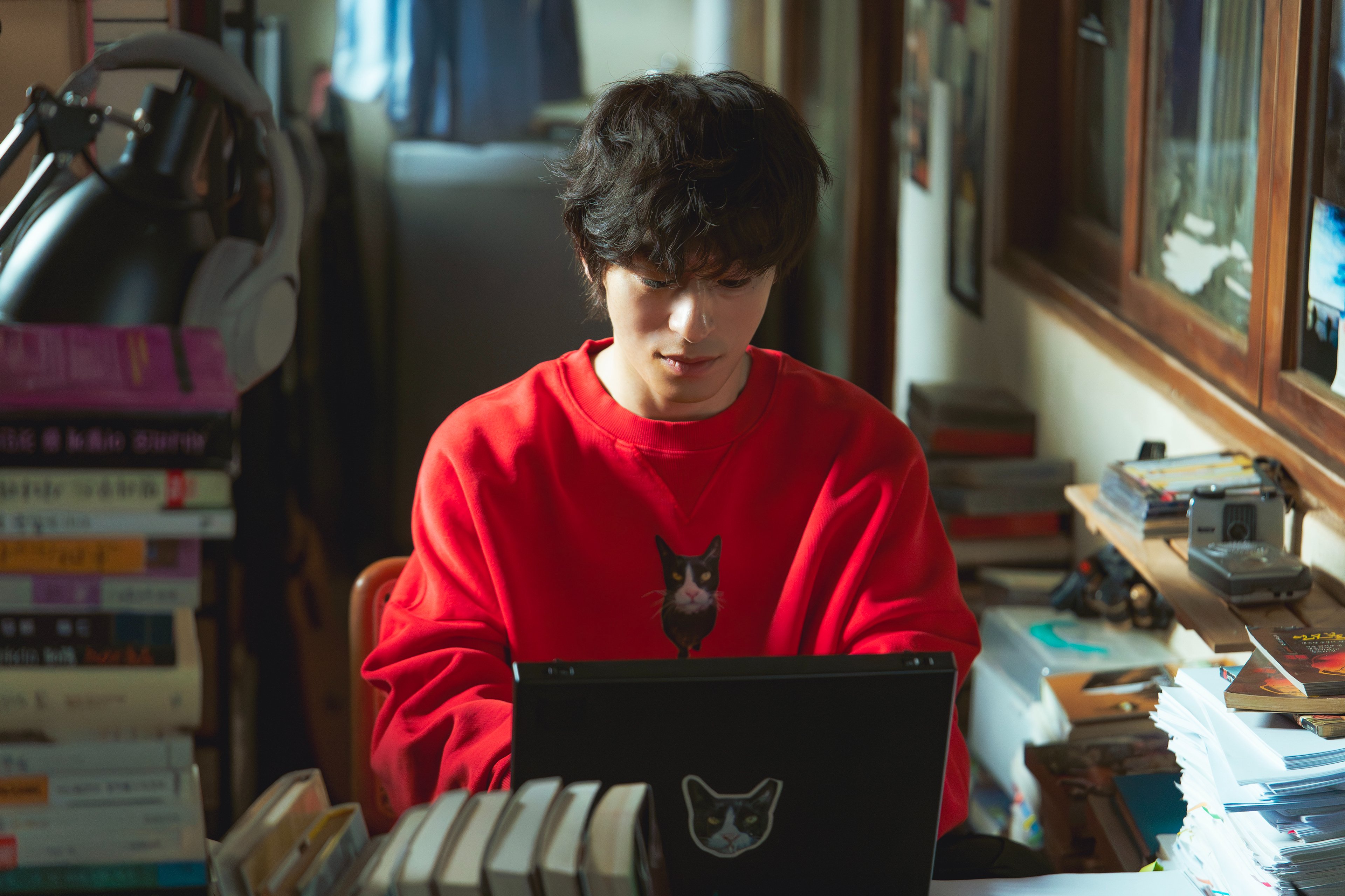 Koo Kyo Hwan as Hwang Dong Man in 'We Are All Trying Here', looking pensive and slightly disheveled in a casual setting.