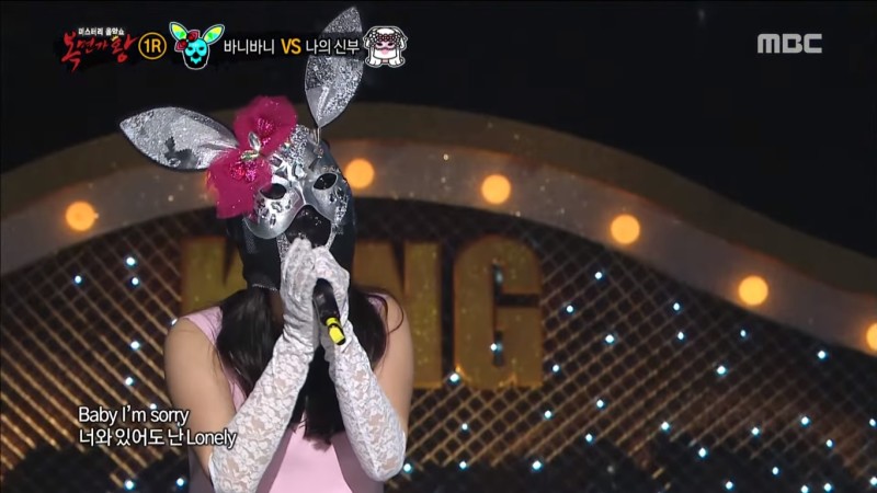 La miembro de un grupo femenino canta su propia versión de “Lonely” de 2NE1 en “King Of Mask Singer”