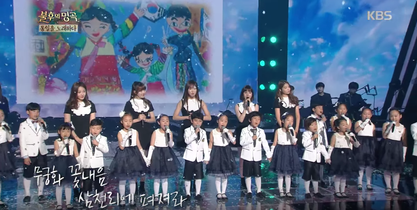 GFRIEND canta una conmovedora canción acerca de la unificación de las Coreas con un coro infantil